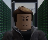 Matthew Beland > Drew University Digital Archives Collections Management > Screenshot 2022-04-12 05.43.46.detail.jpg (Roblox avatar) Smiling figure in a room full of servers